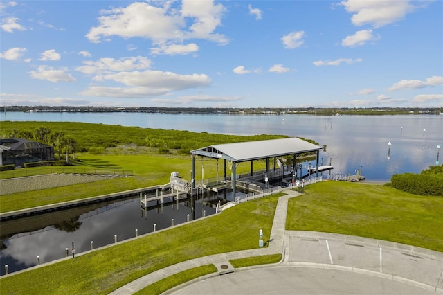 942 Preservation St, Bradenton, FL 34208 - dock with boat lift, a water view, and a lawn