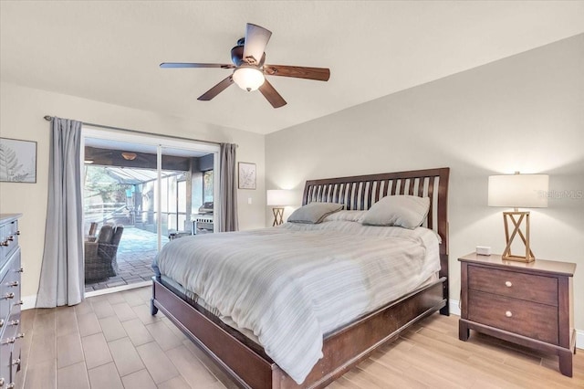 bedroom with access to exterior, light wood-type flooring, and ceiling fan