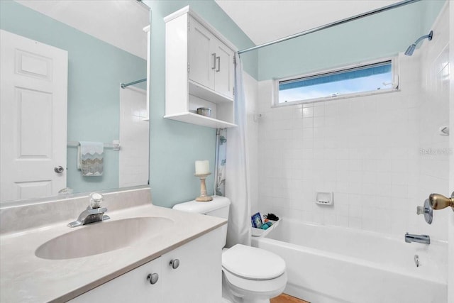 full bathroom with vanity, tub / shower combination, and toilet