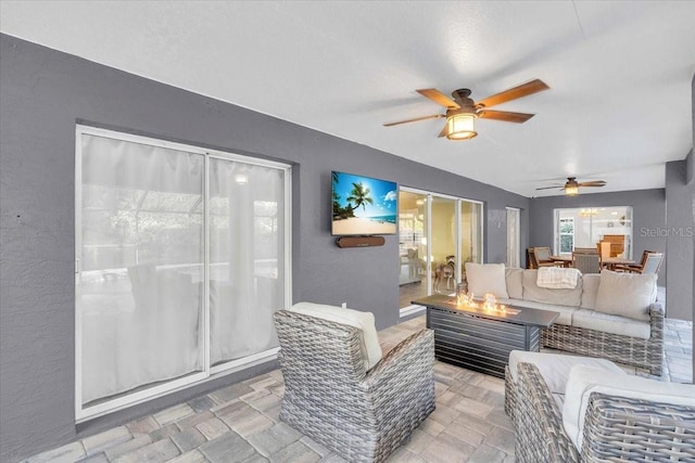 living room with ceiling fan