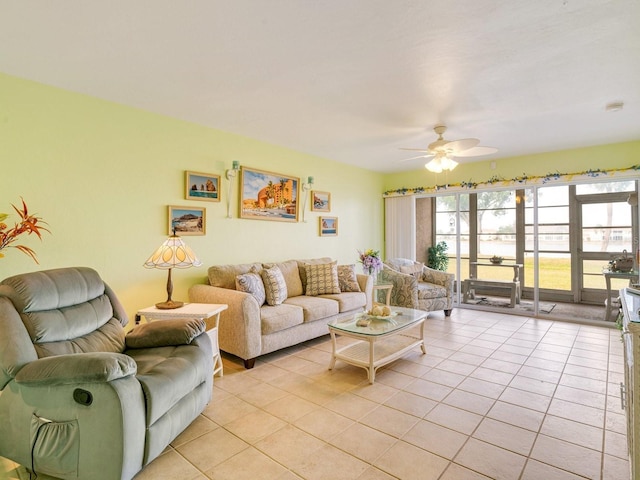 tiled living room featuring ceiling fan