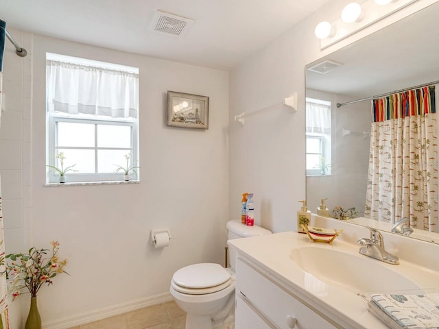 bathroom featuring tile patterned flooring, toilet, vanity, and a shower with shower curtain