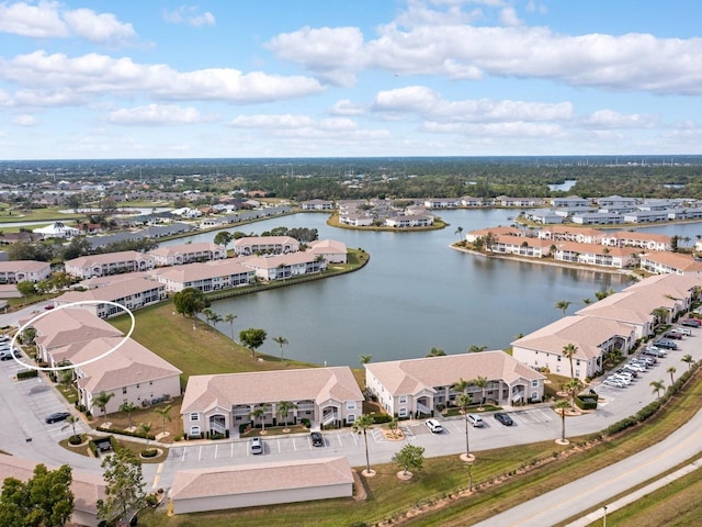 bird's eye view with a water view