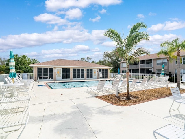 view of swimming pool featuring a patio