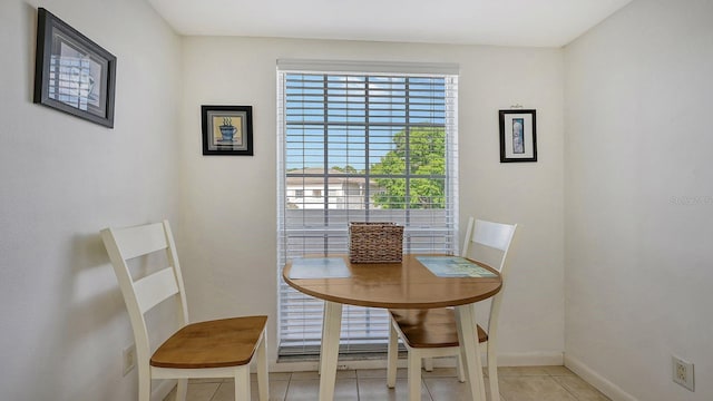 dining room with light tile patterned floors