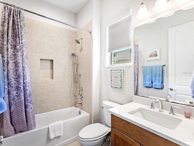 full bathroom with vanity, toilet, and shower / bathtub combination with curtain