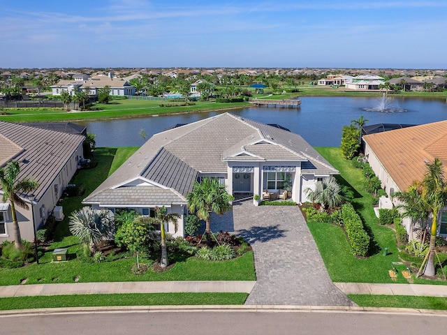 drone / aerial view with a water view