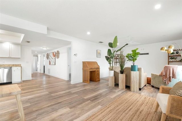 living room with light hardwood / wood-style floors