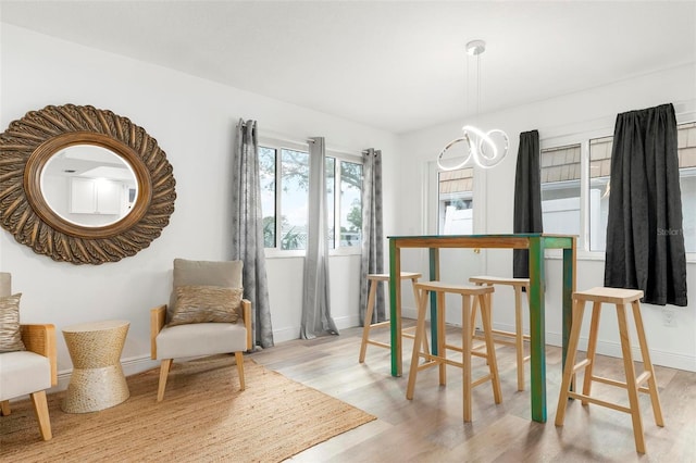 dining area featuring light wood-type flooring