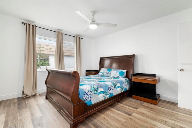 bedroom featuring ceiling fan and light hardwood / wood-style flooring