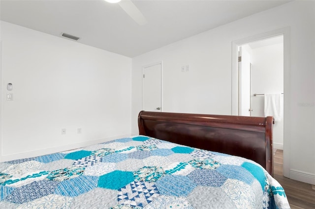 bedroom with ceiling fan and wood-type flooring