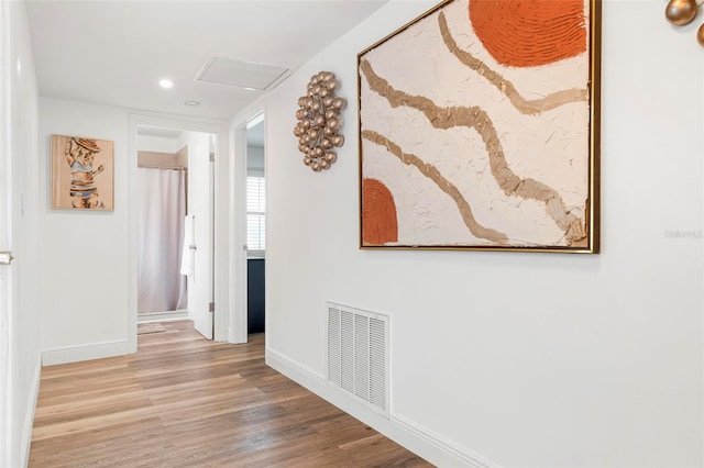 hallway featuring hardwood / wood-style floors