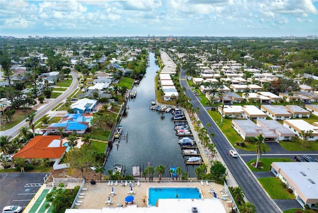 drone / aerial view with a water view