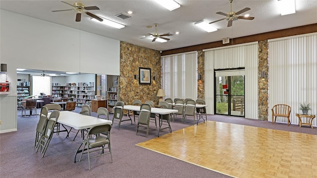 dining area with a textured ceiling