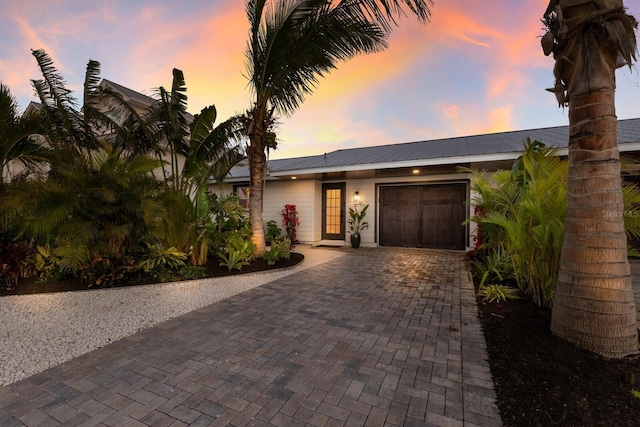 view of front of home featuring a garage