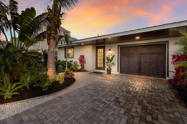 ranch-style home with a garage