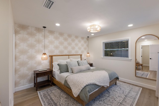 bedroom featuring light hardwood / wood-style flooring