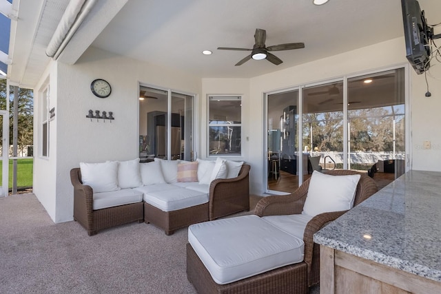 view of patio / terrace featuring an outdoor living space and ceiling fan