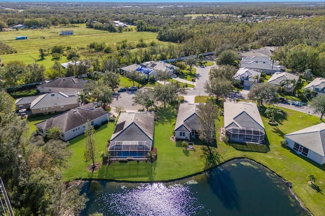 drone / aerial view with a water view