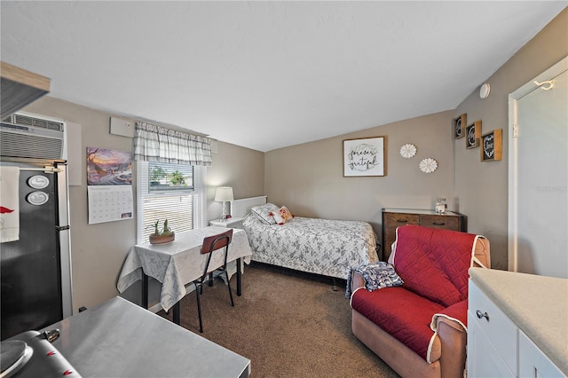 carpeted bedroom featuring stainless steel refrigerator