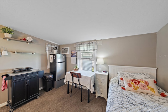 carpeted bedroom featuring a wall unit AC, lofted ceiling, and stainless steel refrigerator