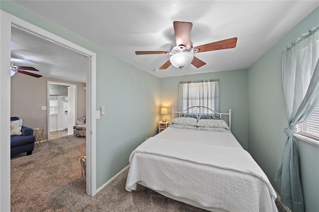 bedroom featuring carpet flooring, ceiling fan, and lofted ceiling