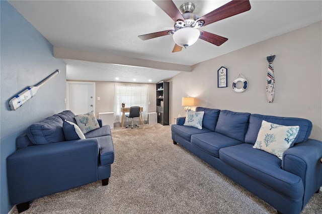 living room featuring carpet flooring and ceiling fan