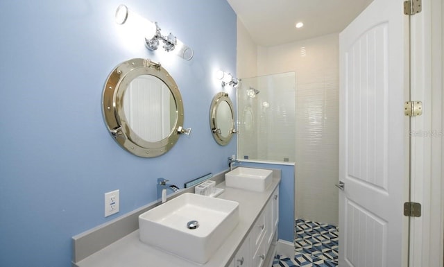 bathroom featuring vanity and walk in shower