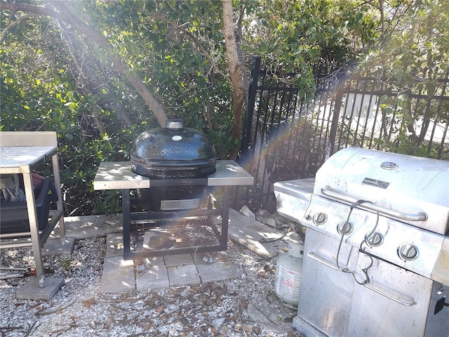 view of patio featuring a grill