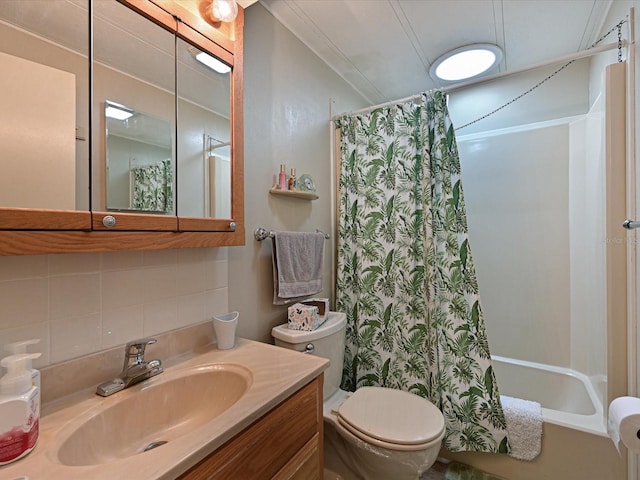 full bathroom with shower / bath combination with curtain, backsplash, ornamental molding, vanity, and toilet