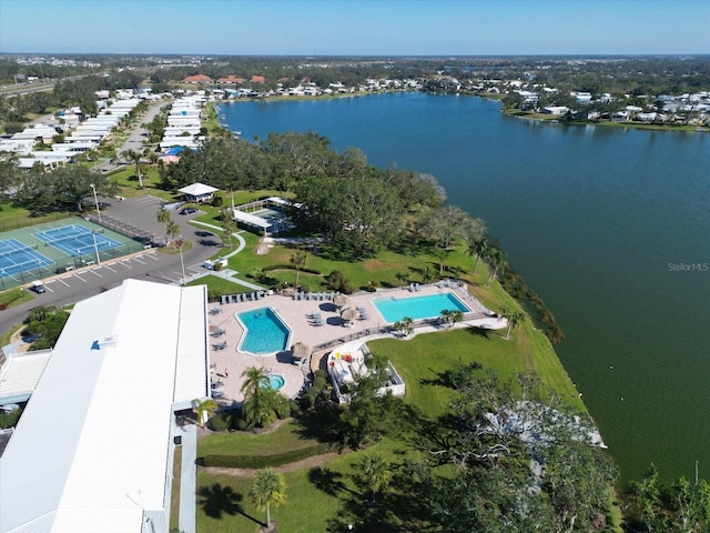 birds eye view of property featuring a water view