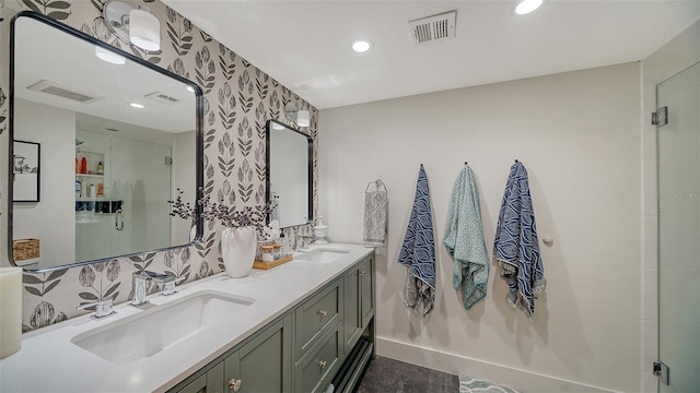 bathroom with vanity and walk in shower