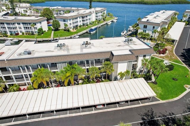 bird's eye view with a water view