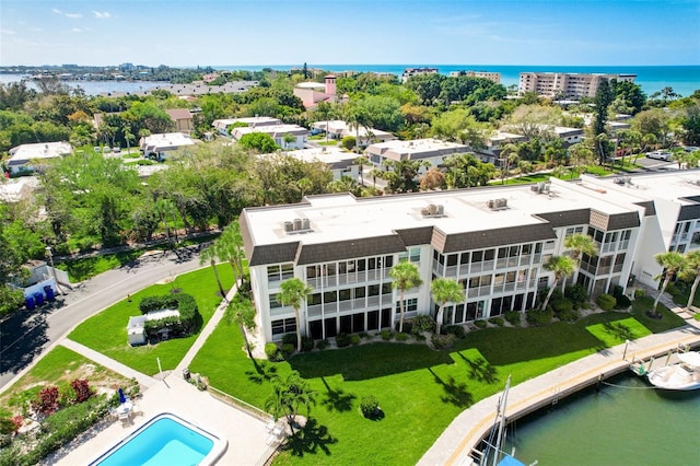 drone / aerial view with a water view