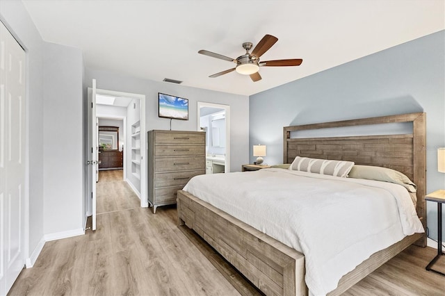 bedroom with ceiling fan and light hardwood / wood-style flooring