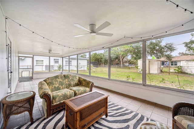 sunroom / solarium with ceiling fan