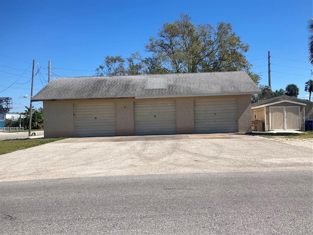 garage featuring central AC unit