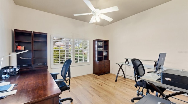 office space featuring ceiling fan and light hardwood / wood-style floors