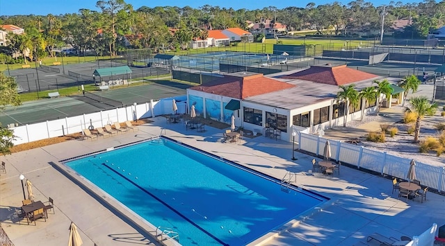 view of swimming pool featuring a patio