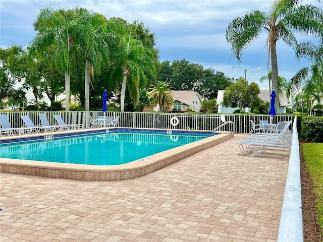 view of pool featuring a patio area