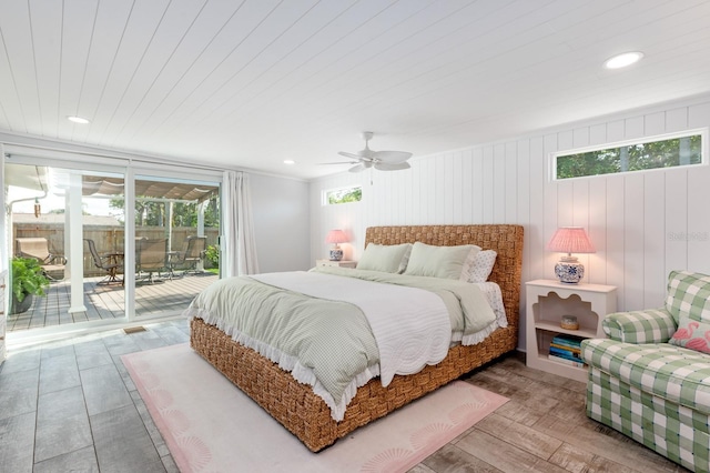 bedroom with hardwood / wood-style floors, ceiling fan, wood ceiling, and access to outside