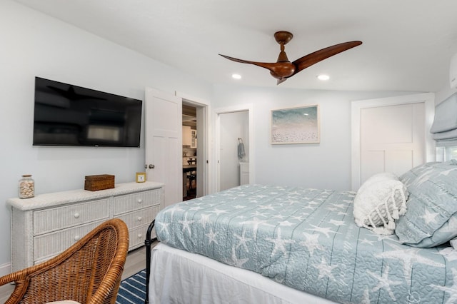 bedroom with ceiling fan and vaulted ceiling