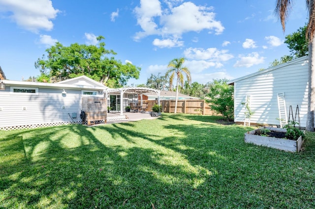 view of yard with a patio area and a pergola