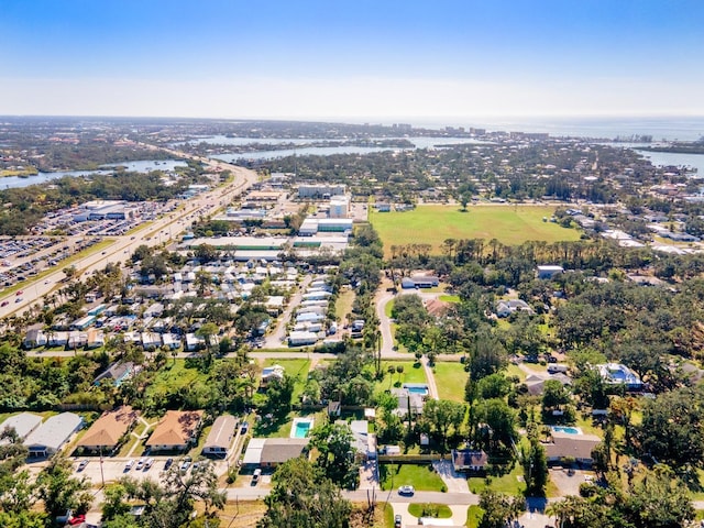 bird's eye view with a water view