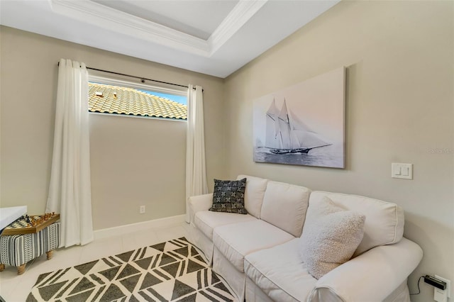 living room with a raised ceiling, crown molding, and light tile patterned floors