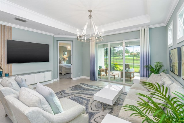 tiled living room featuring a raised ceiling, a notable chandelier, and crown molding