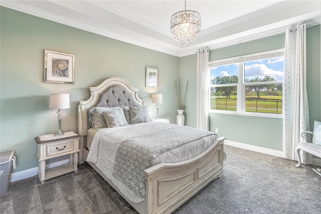 carpeted bedroom featuring a chandelier and ornamental molding