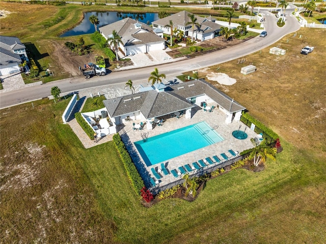 drone / aerial view featuring a water view