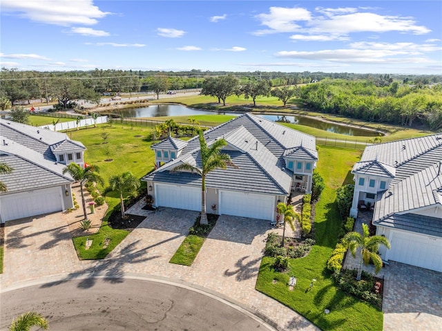 birds eye view of property featuring a water view