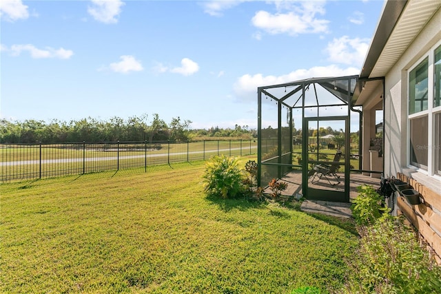 view of yard featuring a rural view and a lanai